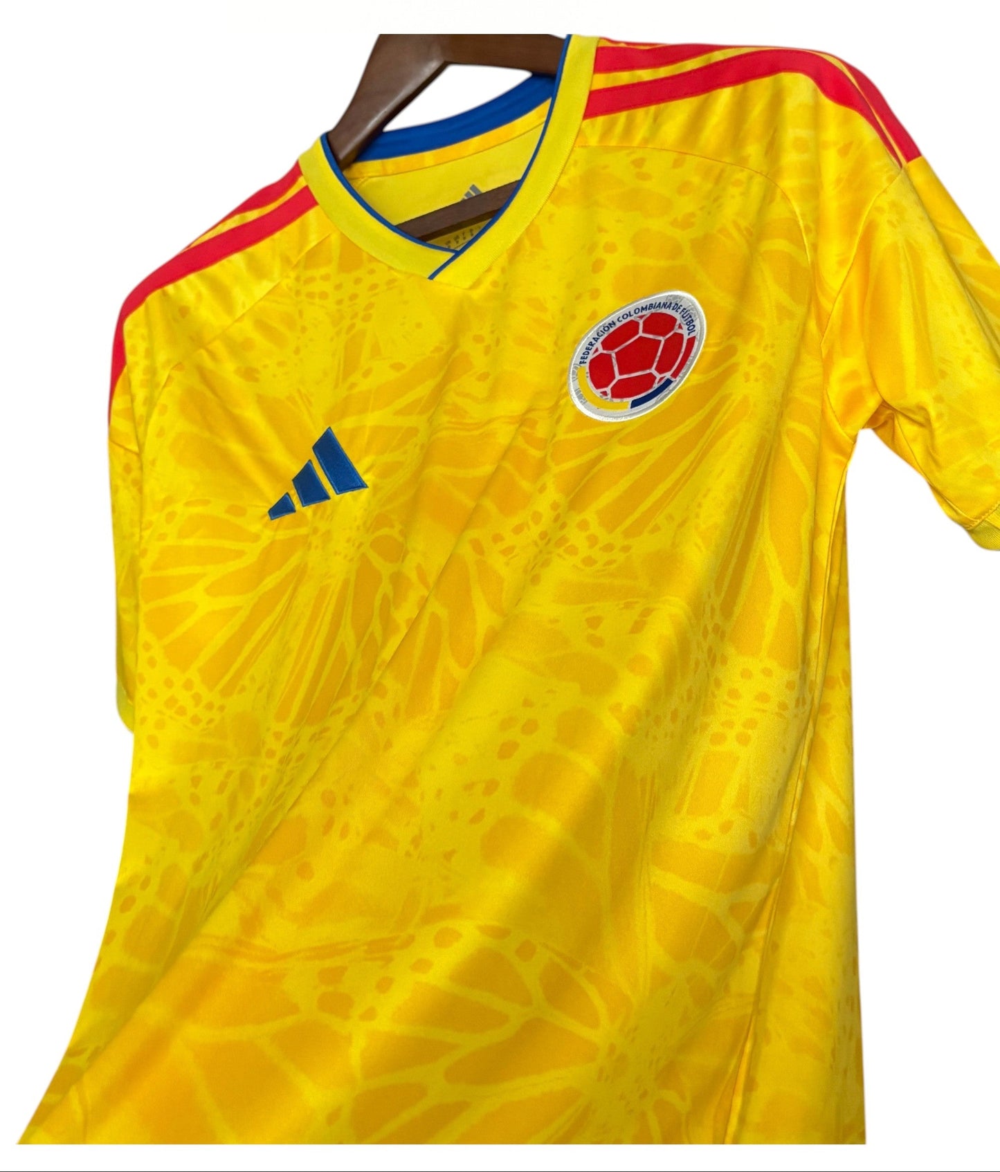 Yellow sports jersey with a logo on a white background, featuring 'Samba Street Co.' branding.