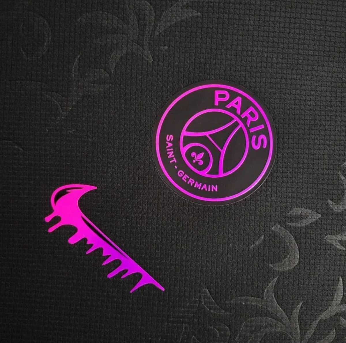 PSG 2024/25 concept football shirt – crest, swoosh and floral fabric detail